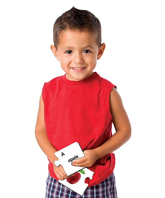 Boy holding Match It ABC puzzle